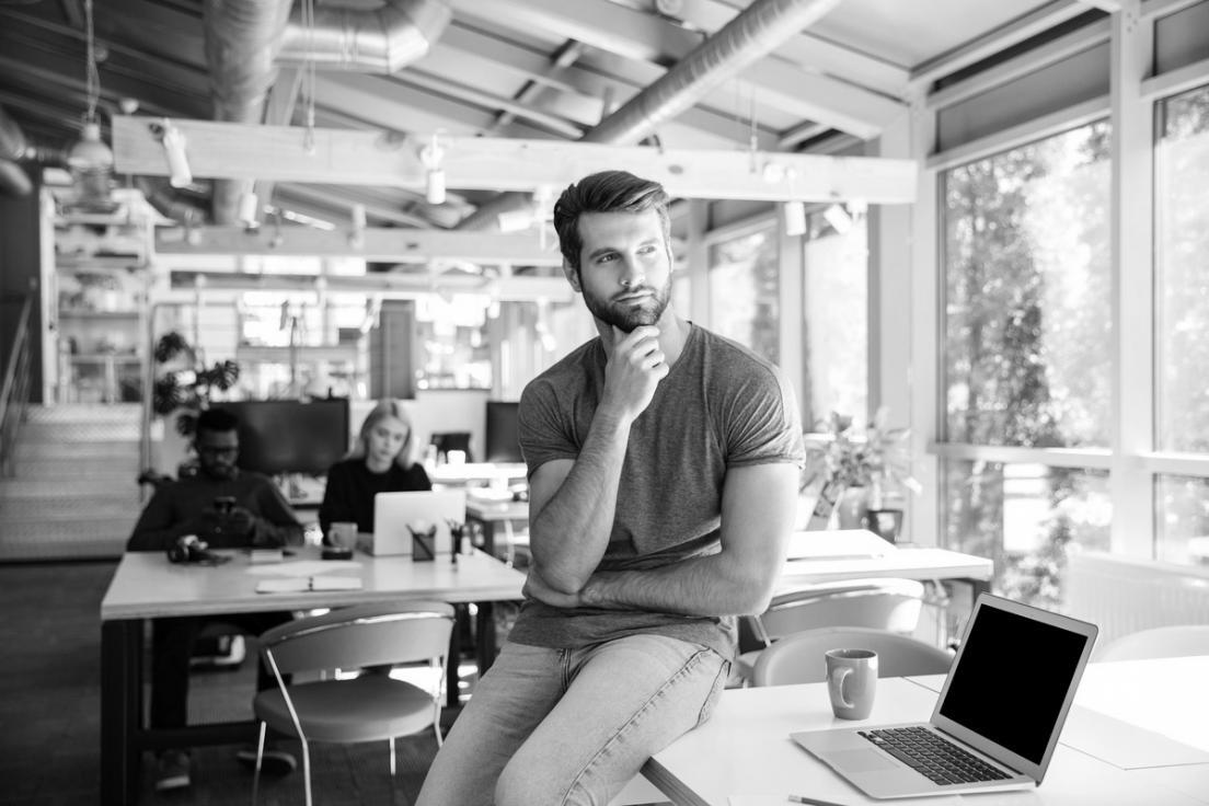 Modern collaborative workspace with team planning session